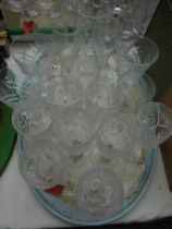 Tray with a number of cut glass wine glasses and pouring jug