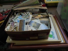 Tin containing huge selection of old collector's tea cards together with Brooke Bond Albums etc,