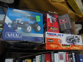 Box containing a number of originally boxed remote control cars,