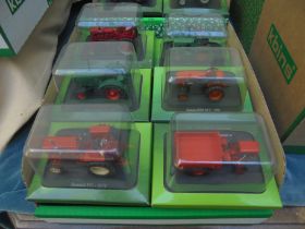 12 boxed miniature tractors by Hachette