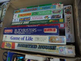 Box of vintage games incl Operation, Pac-Man, Blockbuster,