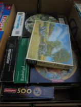 Vary large box containing vintage jigsaws of circular design and others