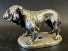 A car mascot in the form of a bulldog, stamped F232 to base, approx. 5" long.