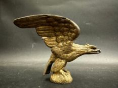 A car accessory mascot in the form of a bird of prey, approx. 3 3/4" high.