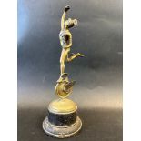 A car mascot in the of Mercury (God of Speed), wooden display base, approx. 10" tall overall.