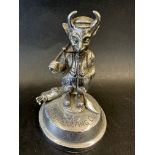 A Lucifer Golfing Club mascot/trophy depicting the society's emblem Lucifer/The Devil playing golf