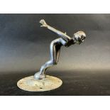 A car mascot in the form of a diving nude female, display base mounted, approx. 4 1/2" tall overall.