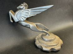 A flying Pegasus car mascot, radiator cap mounted, approx. 7" wide.