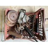 A box of vintage motorcycle parts including flywheels, exhaust etc.