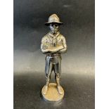 A car accessory mascot in the form of Scout founder Lord Robert Baden-Powell, approx. 5 1/2" high.