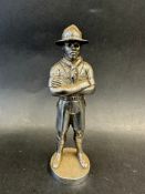 A car accessory mascot in the form of Scout founder Lord Robert Baden-Powell, approx. 5 1/2" high.