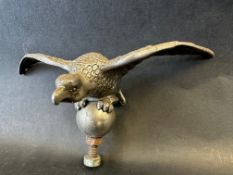 A Desmo eagle on ball car accessory mascot, approx. 7" wide.