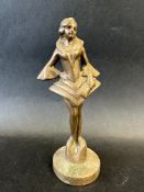 A car mascot in the form of a cabaret girl, Art Deco style design, approx. 6 1/2" tall overall.