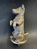 A rare 1920s Asprey of London solid bronze car mascot of a begging dog, stamped A to rear of base,