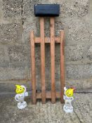 Two reproduction Esso Mr Drip figures plus a workshop slider for working under cars.