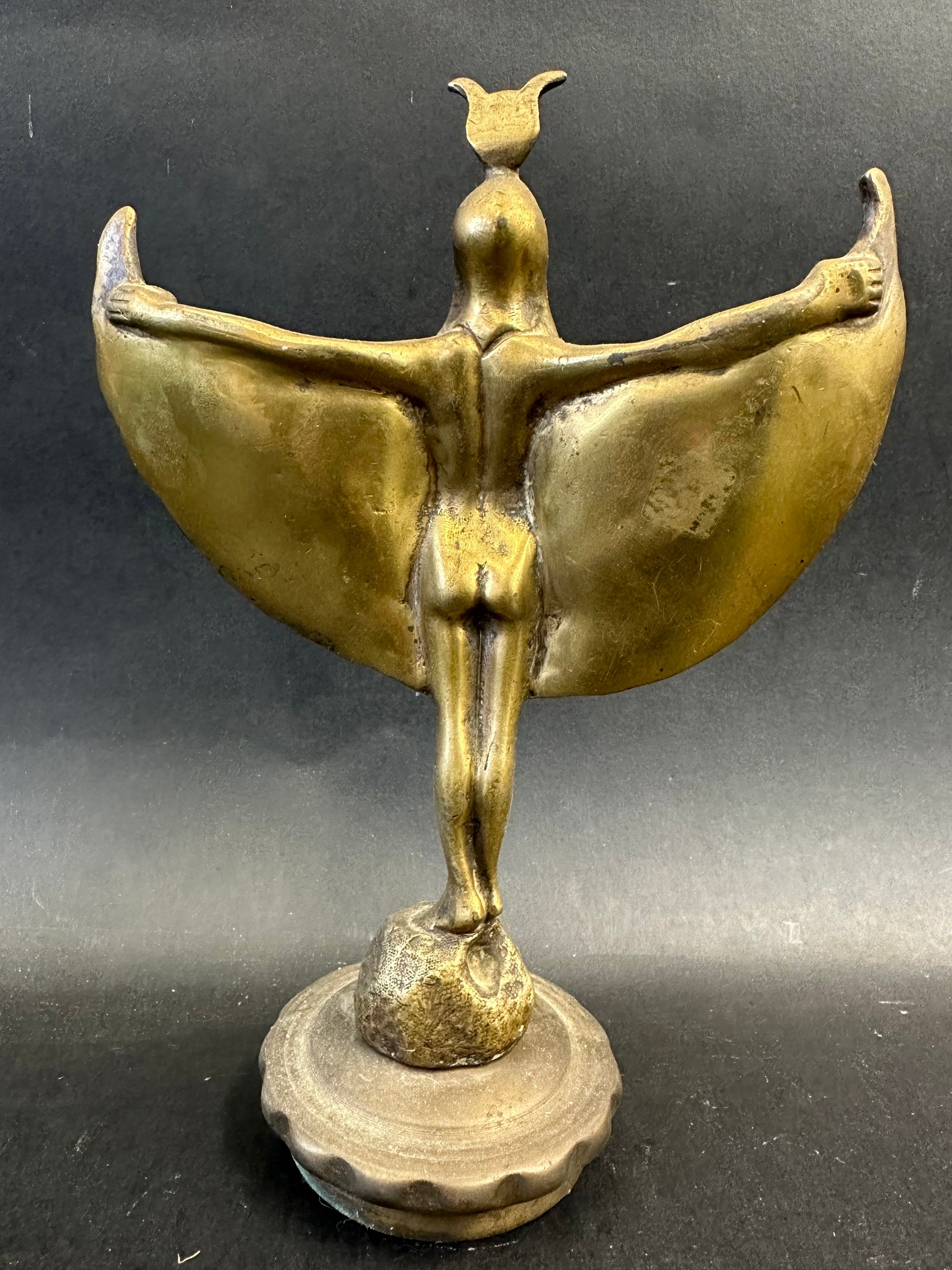 An brass car accessory mascot in the form of an Egyptian winged female, radiator cap mounted, - Image 2 of 2