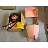 A pedal car dismantled for restoration.