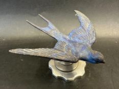 A Swift Cars car mascot, unusually painted blue, radiator cap mounted, approx. 3 1/4" high.