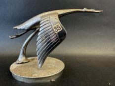 An Art Deco stylised car accessory mascot in the form of a stork in flight, to suit Hispano Suiza or