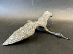A well detailed car accessory mascot in the form of a flying stork, approx 10" wide.