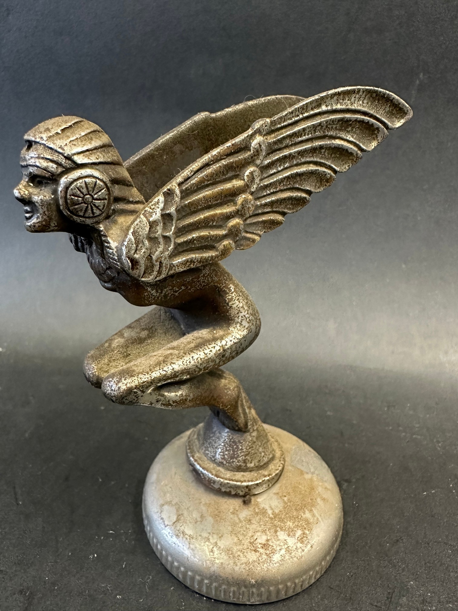 A car accessory mascot in the form of a winged nude crouching female, mounted on a radiator cap, - Image 2 of 5