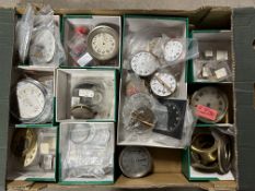 A box of car clocks plus parts from a clock restorer.