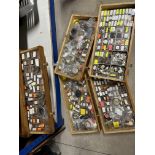 A five drawer chest containing a large array of car clock parts from a clock restorer.