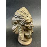 A very well-detailed bronze car accessory mascot in the form of a Native American Chief, display