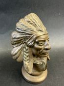 A very well-detailed bronze car accessory mascot in the form of a Native American Chief, display