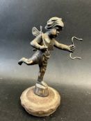 A car accessory mascot in the form of cupid, by A.E. Lejeune, mounted on a radiator cap, approx. 6