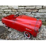 A 1950s Tri-ang pedal car.