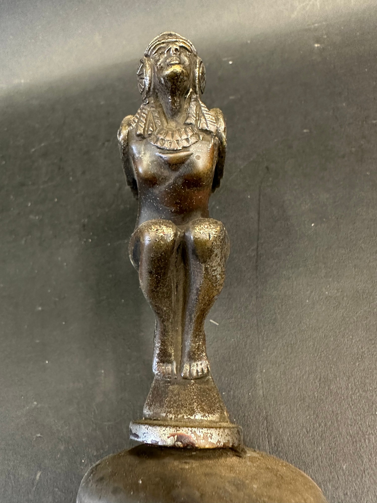 A car accessory mascot in the form of a winged nude crouching female, mounted on a radiator cap, - Image 5 of 5