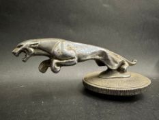 A leaping jaguar car mascot on a large radiator cap, approx. 8" overall length.