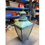 A Victorian design verdigris copper square lantern of tapering form with finial.