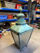 A Victorian design verdigris copper square lantern of tapering form with finial.