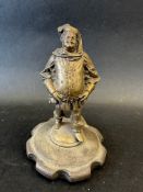 An unusual car mascot in the form of a portly gentleman, perhaps a sultan(?), mounted on a