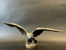 A car accessory mascot in the form of a bird of prey with outstretched wings, approx. 8" wide,