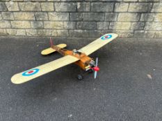 A radio controlled vintage model aircraft, approx. 58" wingspan.