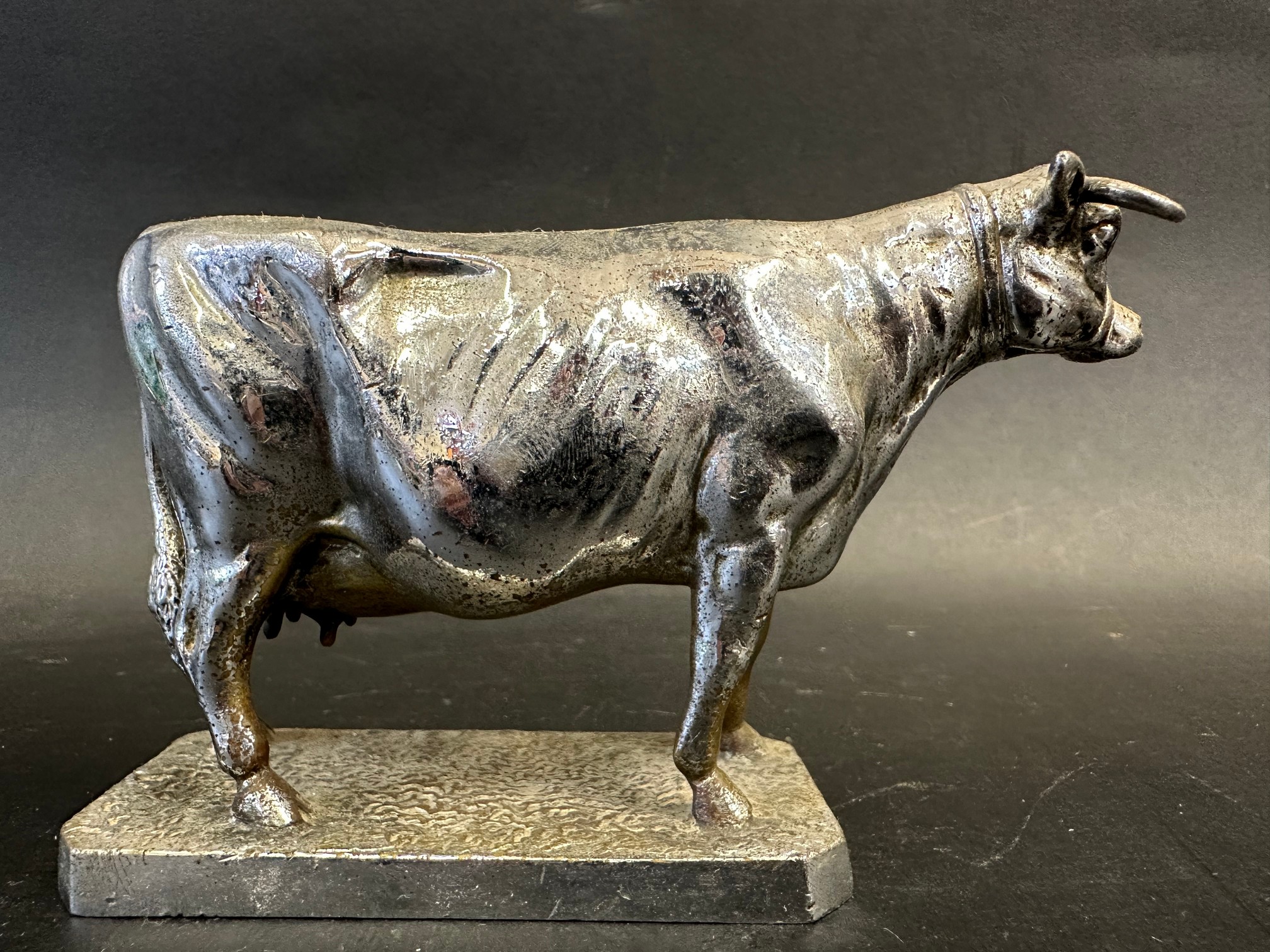 A car accessory mascot in the form of a cow, approx. 3 1/2" high. - Image 2 of 5