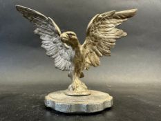 A car accessory mascot in the form of a bird of prey with outstretched wings, approx. 5 1/4" high.