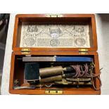 A mahogany cased magneto improved electric machine.