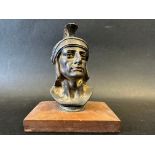 A car accessory mascot in the form of a Roman soldier, display base mounted, approx. 5 1/4" high.