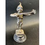 An Edwardian car mascot stamped Dinkie Doo depicting a winged character with blue glass eyes
