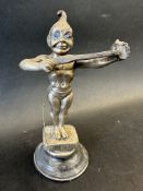 An Edwardian car mascot stamped Dinkie Doo depicting a winged character with blue glass eyes