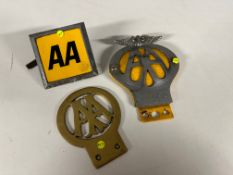 Three assorted AA badges.
