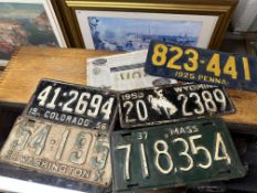 A group of early American number plates including 1925 Penna, 1930 Washington, 1937 Mass., 1950