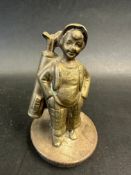 A car accessory mascot in the form of a golfer, mounted on a radiator cap, approx. 3 3/4" high
