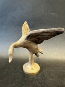 An Asprey car mascot in the form of a flying goose, stamped Asprey to front of base, approx. 5 1/