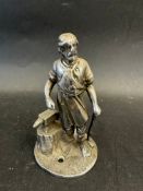 A Vulcan mascot in the form of a blacksmith, approx. 4 1/2" high.
