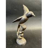 A car accessory mascot in the form of a bird perched on a branch, approx. 7" high.